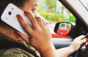 Woman on the Phone in Her Car